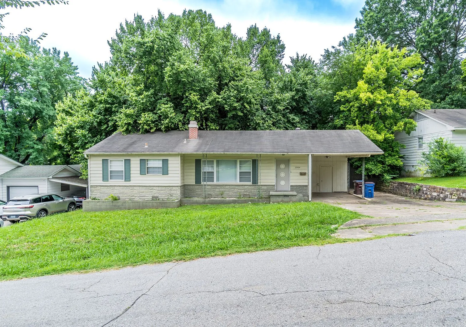 Cozy Comfort in a Great Location: Spacious 3 Bed, 1 Bath Residence with Carport! — Photo 1