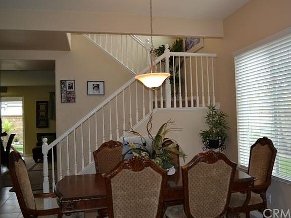 Entry way with Living Room and formal dining area