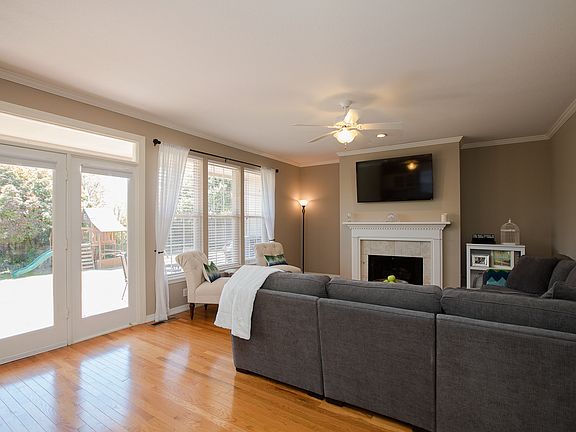 Generous family is wired for wall-mounted tv and will accommodate full-sized furniture.