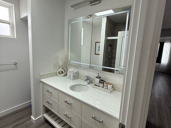 Modern bathroom with light up miror.