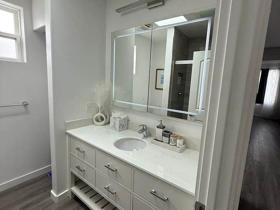 Modern bathroom with light up miror.