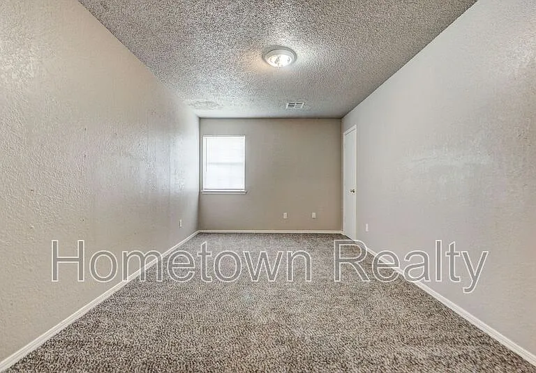 310 NW 118th St — Photo 37