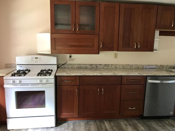 Kitchen gas stove, new vinyl floor
