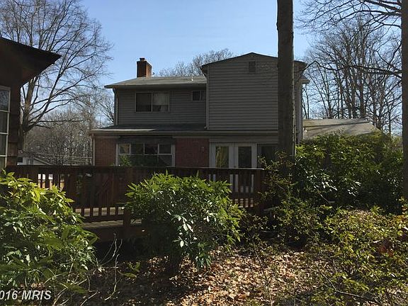 Private wooded setting; huge addition off rear
