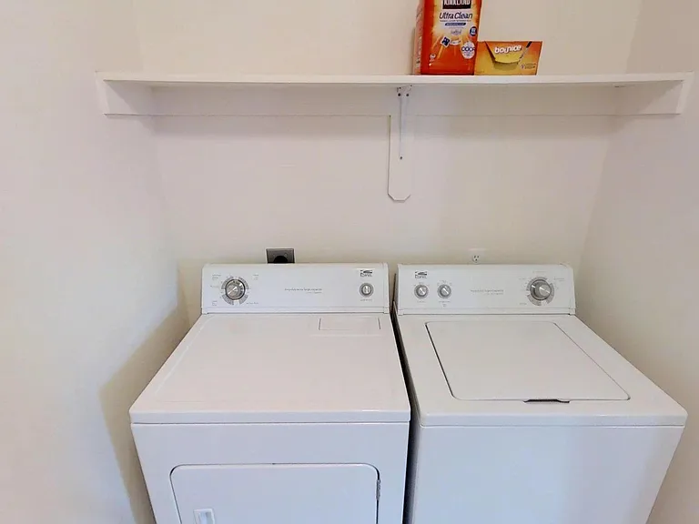 Walk-in laundry room.