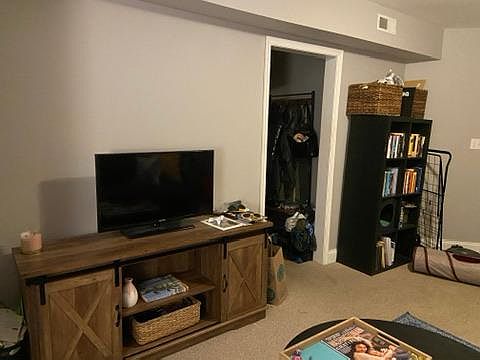 Living room and door from front entry.