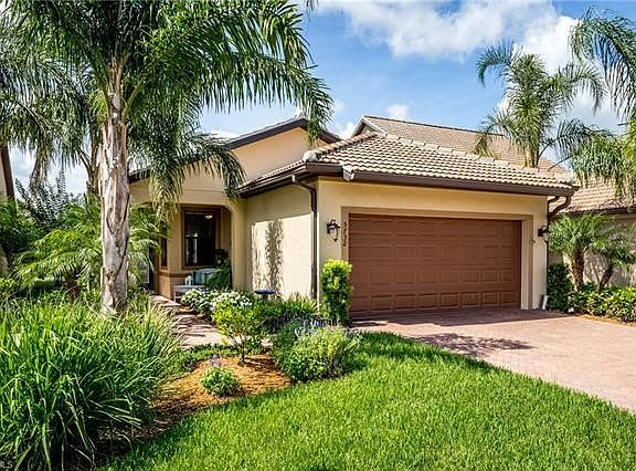 Beautiful Landscaping with yard work included in HOA fees