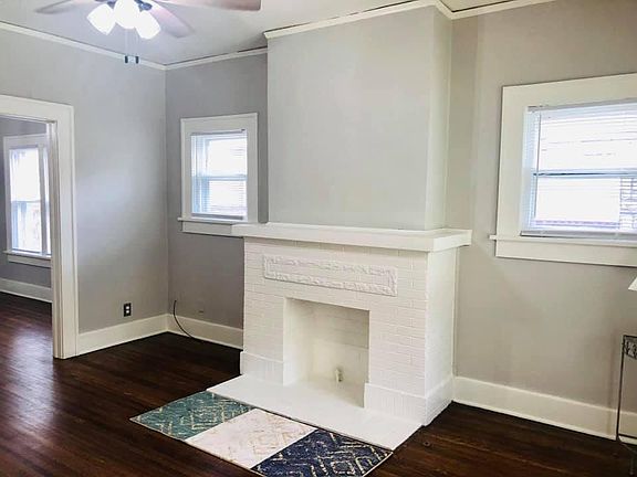 Original fireplace is non-functioning but still provides the quaint charm of your typical craftsman home. Large mantle perfect for your personal decor or to hang stockings during the holiday season.