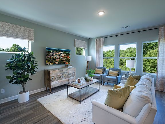 The Lennon floorplan modeled at Village at White Pine.