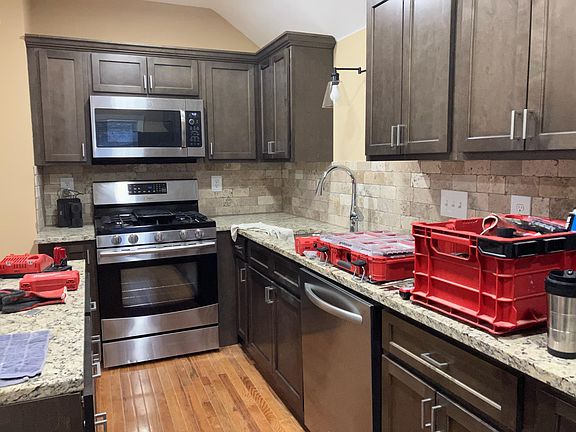 New Kitchen Cabinets w/Crown Molding, Granite Countertops, SS DW, OTR MW & Range