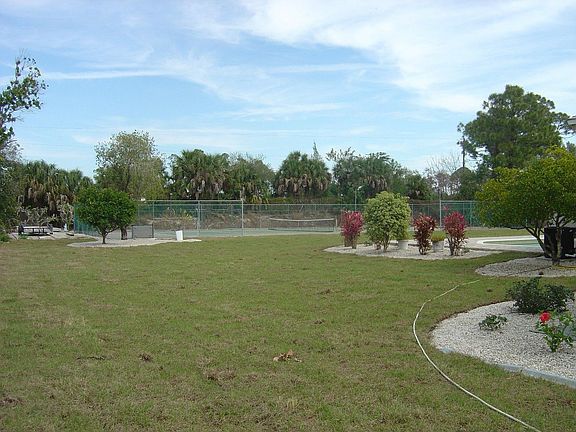 Large yard & Tennis Court