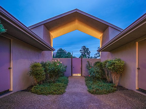 Front Entry lined with Roses