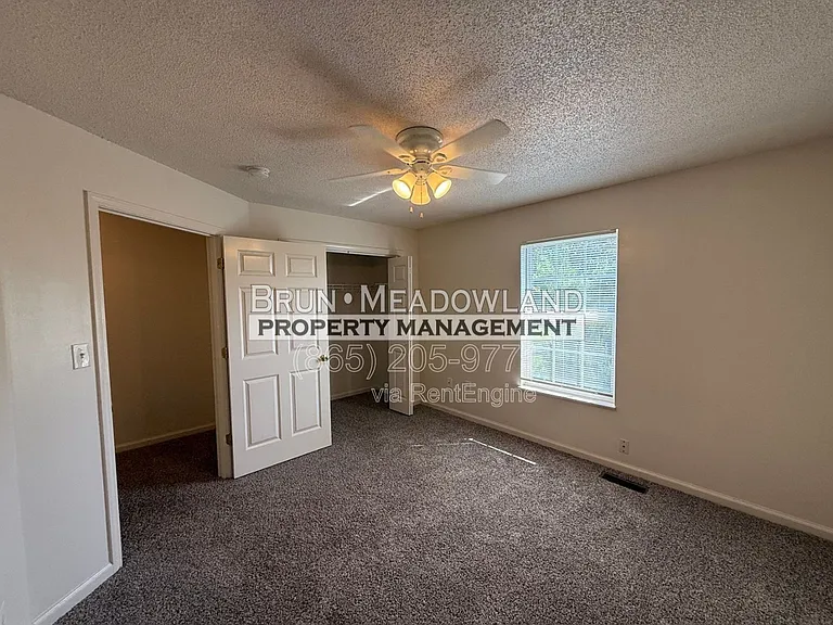 5620 Boxwood Garden Way — Photo 24
