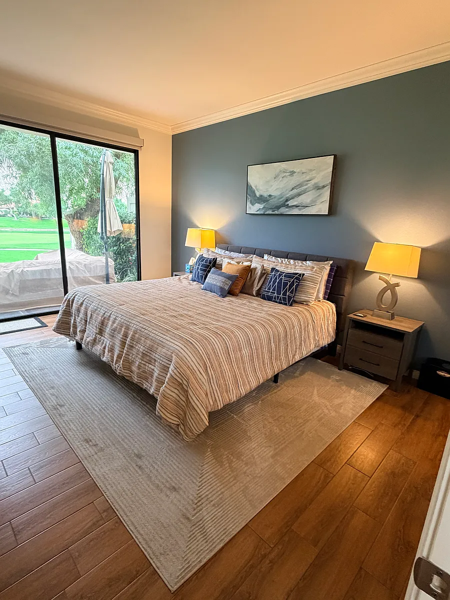 Photo 1 of 12 - 54529 Oakhill - La Quinta, CA Primary bedroom overlooking Santa Rosa mountains and 7th hole on Palmer Private golf course - 54529 Oakhill