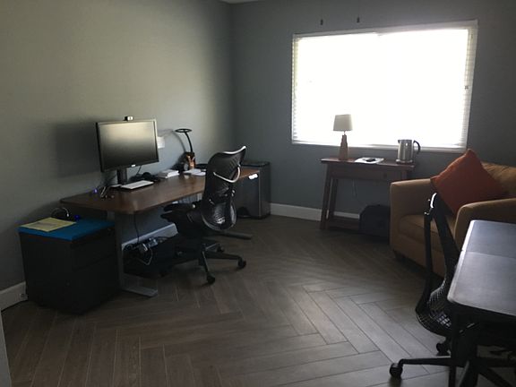 Office w/ barn door off LR