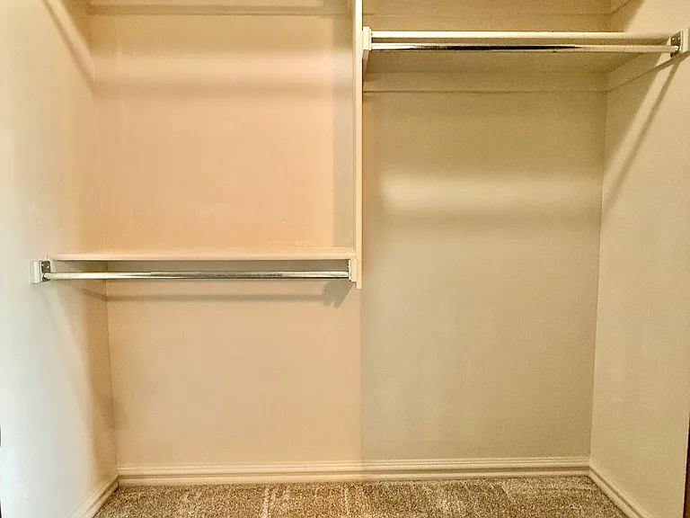 Unique large designs for this walk-in closet. No need to get a storage unit when you have options with this house.