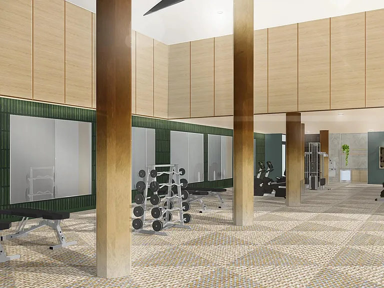 A thoughtfully designed fitness studio with strength training zones and a clean, energizing layout.