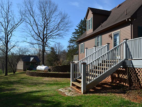 Back view of private deck. Door leads to kitchen and dining area inside.