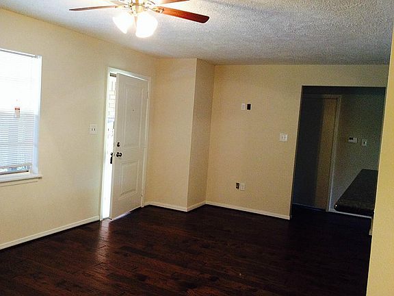 Entrance to this home. Look at the high end laminate flooring! The spot on the wall is wired for you