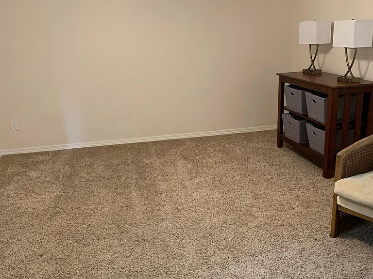 Space in 2nd bedroom for queen or king bed. Chest/baskets/lamps provided. 2 wicker chairs for end of bed. Fan with lights.
