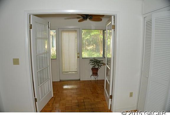 Foyer leads to sun room