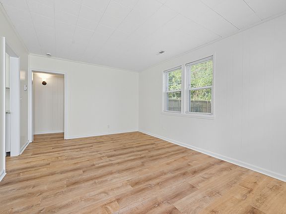 Entryway, living room, dining room