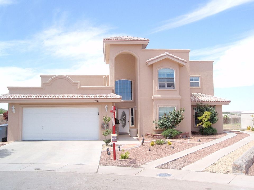 Outside view, extra driveway/parking on side