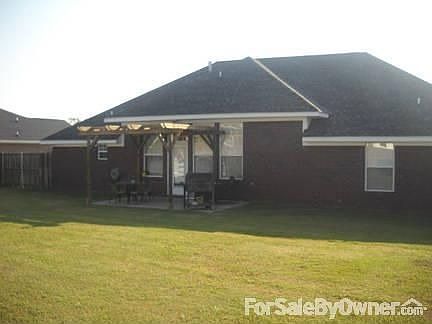 view of backyard from storage shed