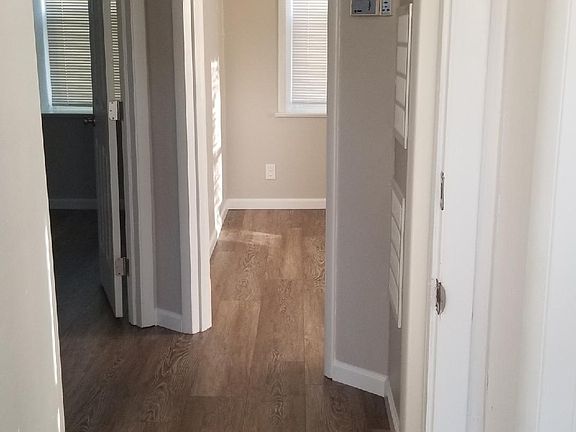 Front door hallway to kitchen