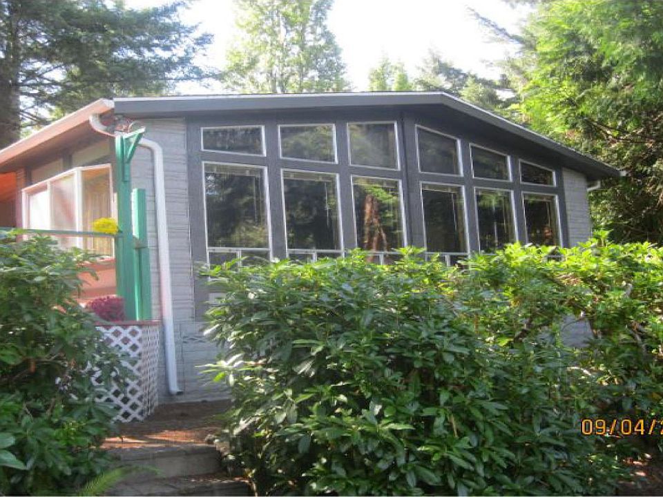 Front of house facing the Lake with gorgeous views.