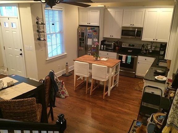 kitchen with open dining/living room