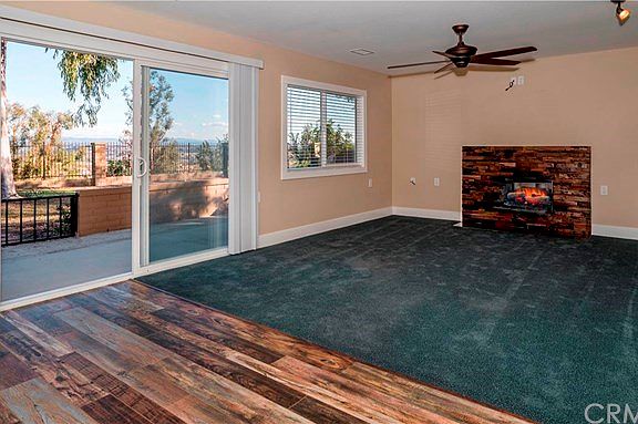 LIVING ROOM - NEW DUAL PANE WINDOWS - ELECTRONIC FIREPLACE/HEATER