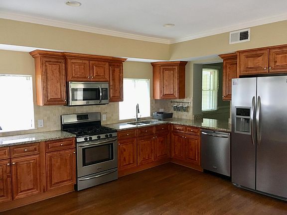 Granite Counter tops, Stainless Steel appliances & hardwood floors