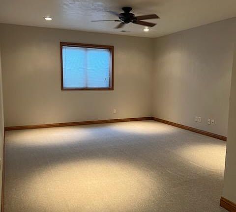 Lower level family room wired for surround sound
Photo with new carpet/paint