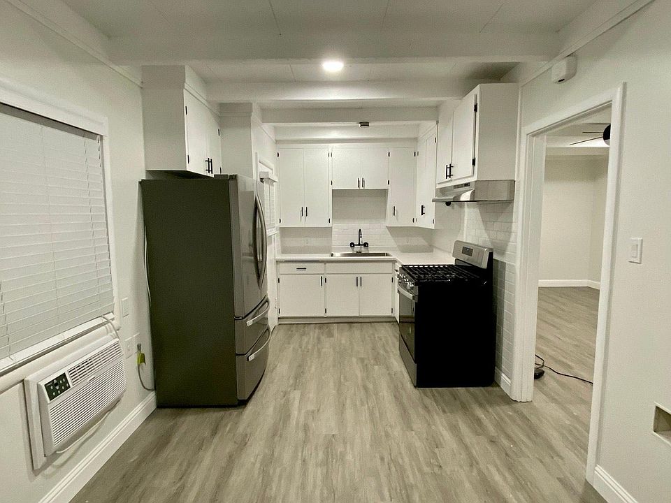 Dining room with high powered wall ac. Ac placed November 2021