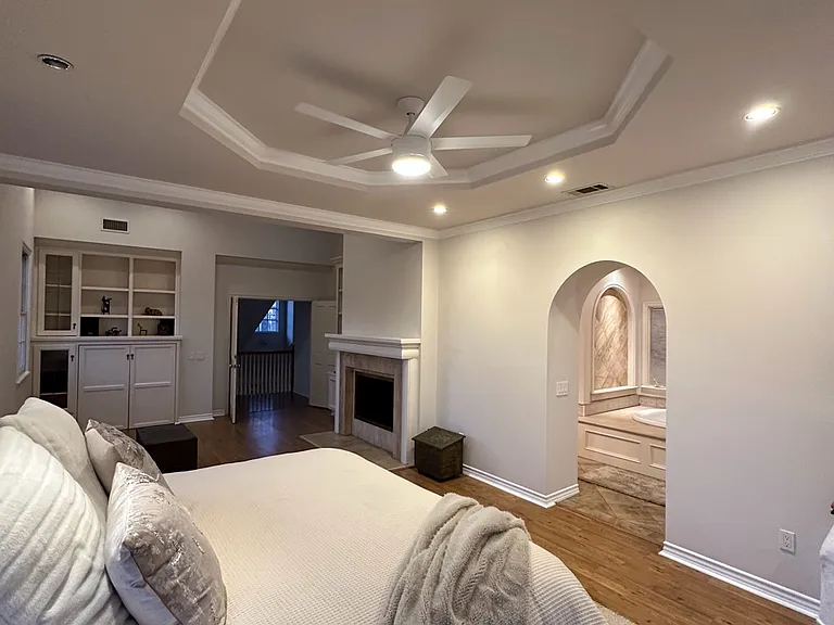 Primary bedroom includes fireplace, sitting room adjacent to huge bathroom