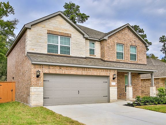 This home even has a covered porch and patio