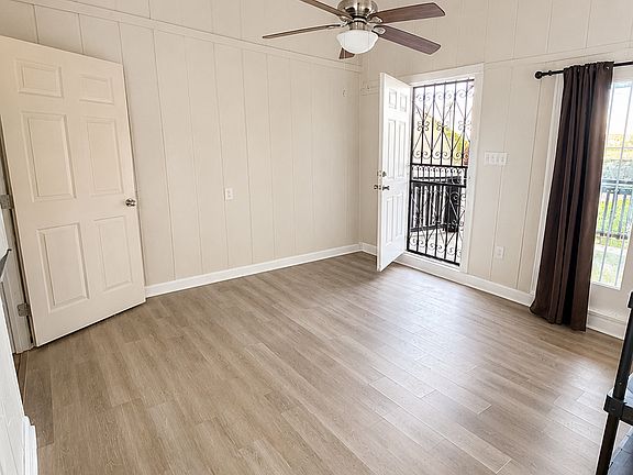 Living room with extra storage closet
