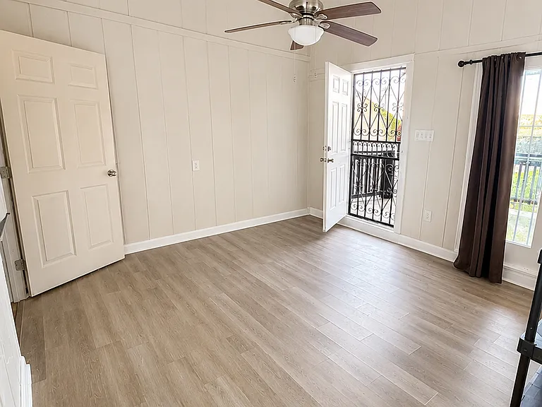 Living room with extra storage closet