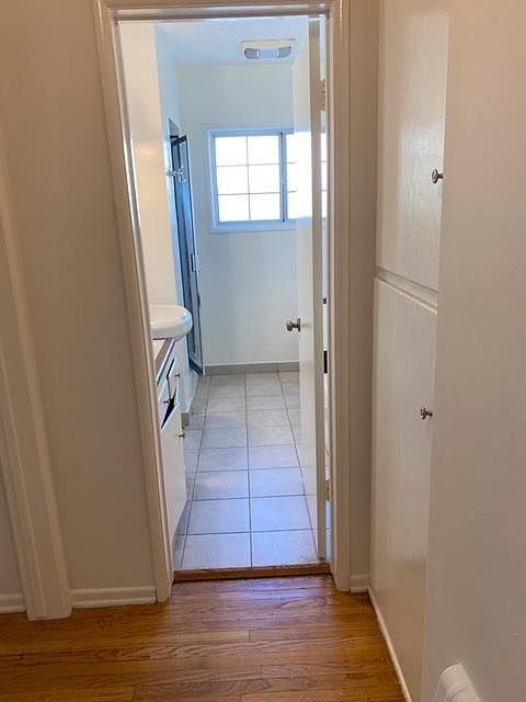 storage closets leading to bathroom