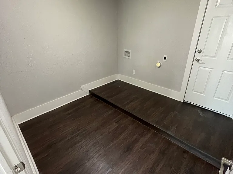 Spacious laundry room with built in storage! Washer and dryer will be included