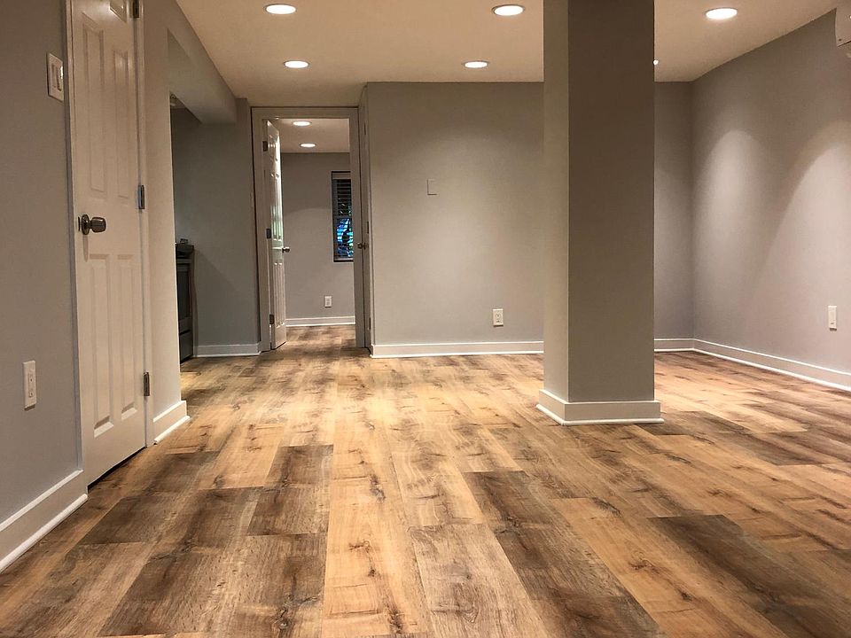 View from the front door showing the open-concept living & dining room