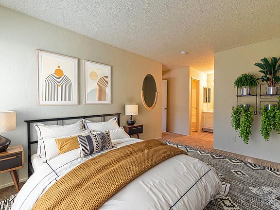 Expansive bedroom with an open layout and natural flow.