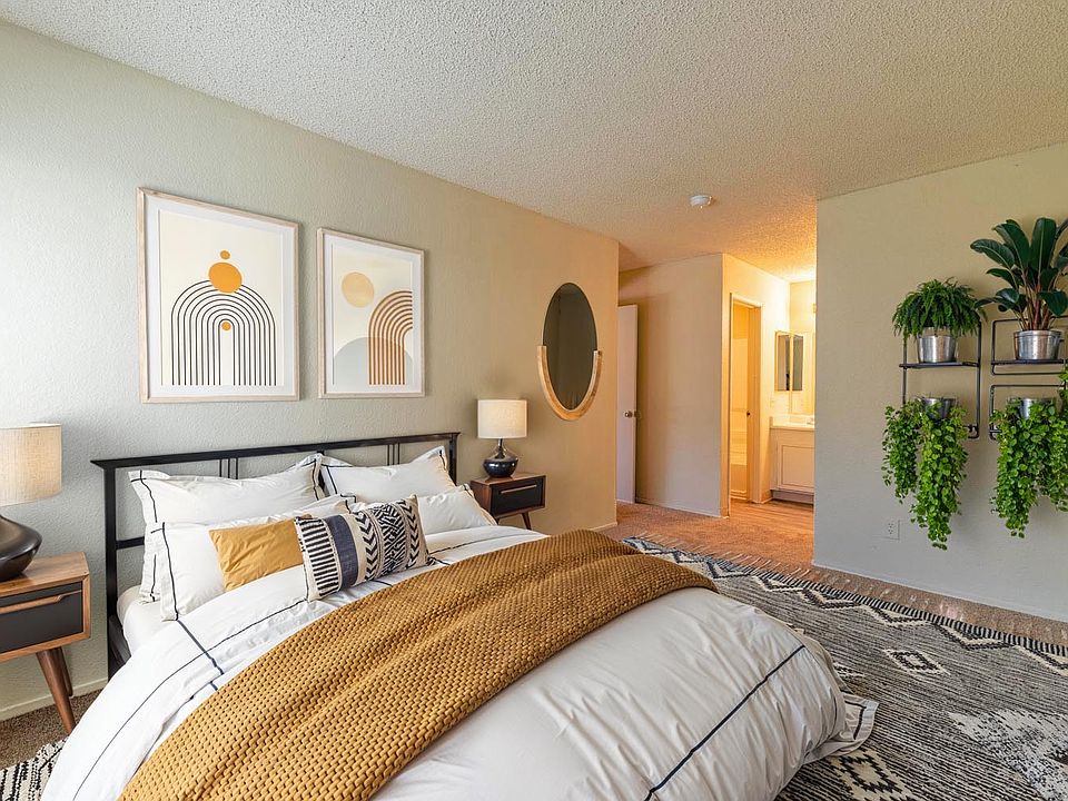 Expansive bedroom with an open layout and natural flow.
