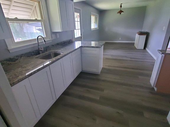 brand new granite counter and cabinets.