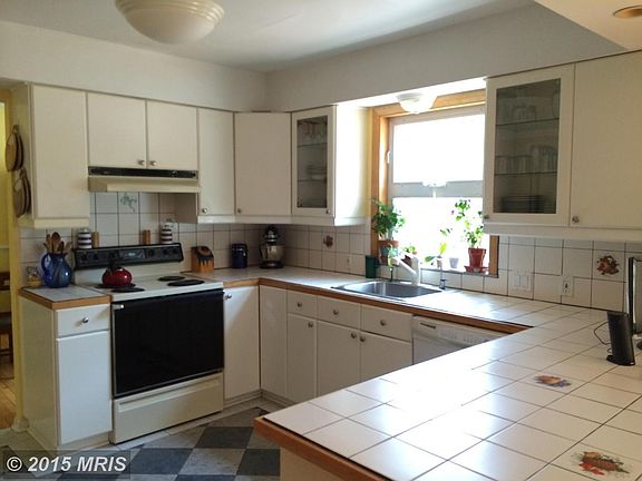 Bright, Sunny Kitchen Overlooks Backyard