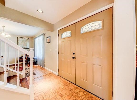 New Front Doors with Leaded Glass inserts 2016. New engineered hardwood flooring in hallway. New hardwood treads on steps replaced carpeting 2016.