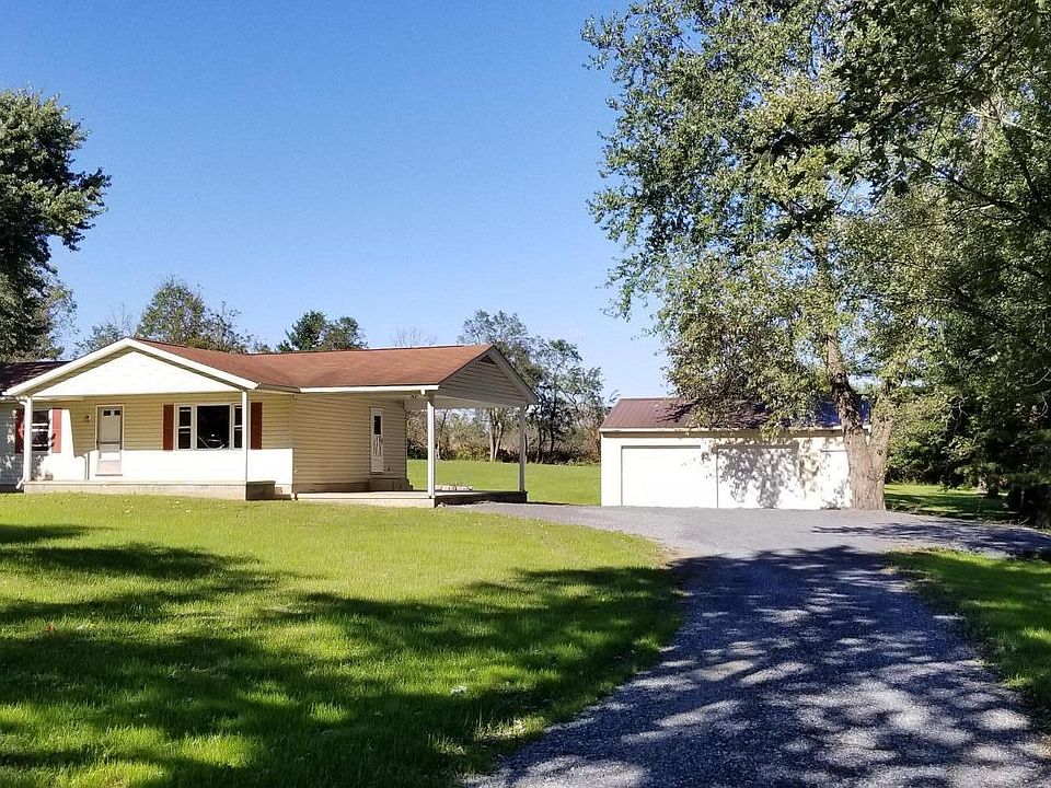Front of House with Detached Two Car Garage