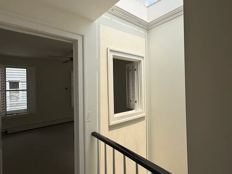 Huge skylight bathes the whole home in natural light and provides unique character. A plant parent's dream!