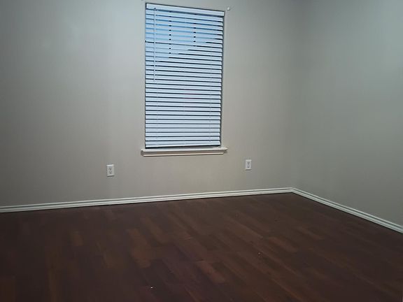 Faux Mahogany flooring in Master Bedroom